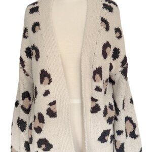 Really cute comfy cheetah sweater distressed at hemline and cuffs.
